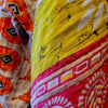The Window, Milford Haven orange and yellow cotton Kantha kimono with traditional hand-stitched quilting detail.