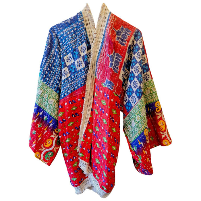 The Window, Milford Haven red and navy Kantha-stitched cotton kimono with wide sleeves and a soft fringed border.