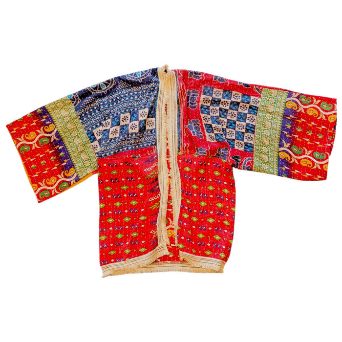 The Window, Milford Haven red and navy Kantha-stitched cotton kimono with wide sleeves and fringed border details.