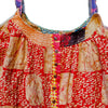 The Window, Milford Haven red and turquoise Kantha cotton oversized overalls with button-down front and quilt detail.