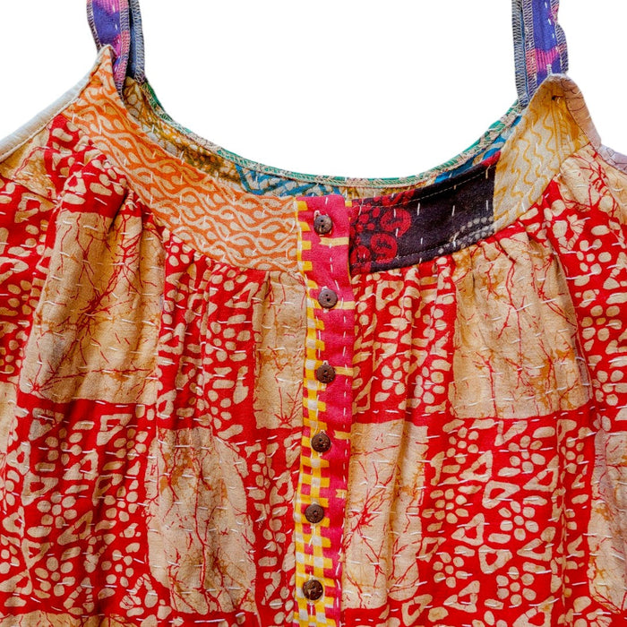 The Window, Milford Haven red and turquoise Kantha cotton oversized overalls with button-down front and quilt detail.