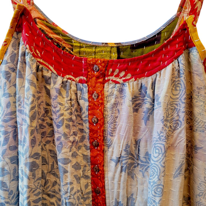 The Window, Milford Haven GRINGO FAIRTRADE oversized cotton overalls featuring grey and turquoise Kantha quilting.