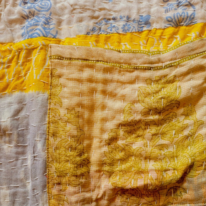 The Window, Milford Haven Kantha cotton overalls featuring yellow and grey floral quilting with white running stitches