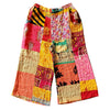 The Window, Milford Haven wide leg Kantha trousers in multicoloured patchwork cotton with a turquoise waistband.