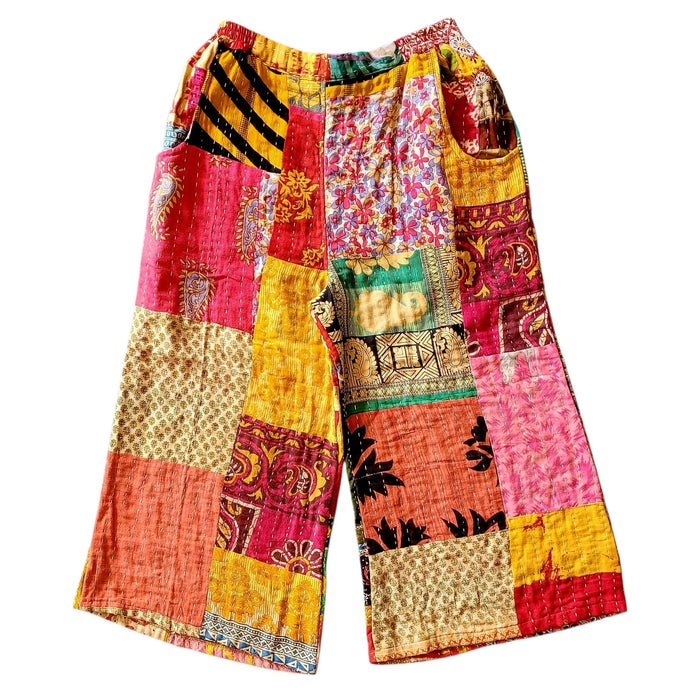 The Window, Milford Haven wide leg Kantha trousers in multicoloured patchwork cotton with a turquoise waistband.