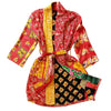 The Window, Milford Haven Kantha quilted cotton dressing gown in red, yellow, and black with butterfly motifs.