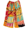 The Window, Milford Haven wide-leg Kantha trousers in multi-coloured quilted cotton with a green waistband.