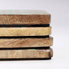 The Window, Milford Haven square mango wood coasters with colourful Mediterranean tile patterns stacked on a table.