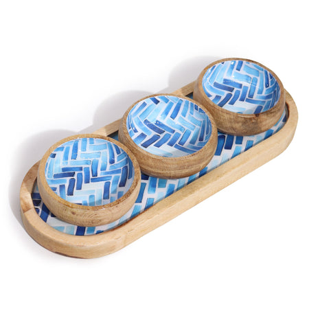 The Window, Milford Haven mango wood serving tray with three matching bowls featuring a blue geometric stripe pattern.