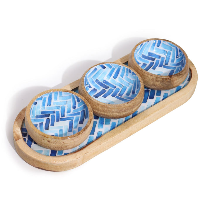 The Window, Milford Haven mango wood serving tray with three matching bowls featuring a blue geometric stripe pattern.