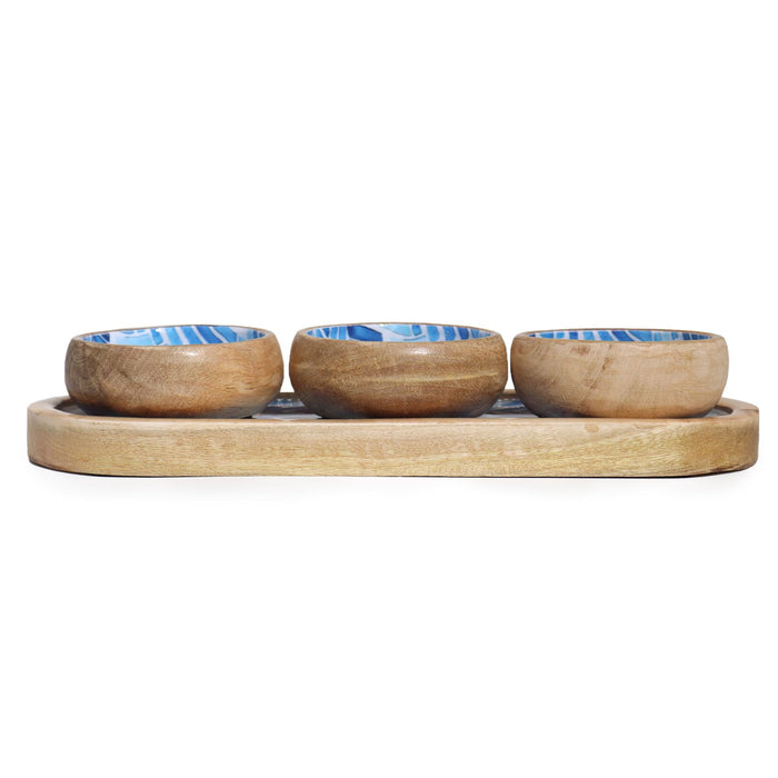 The Window, Milford Haven mango wood serving tray with three matching bowls featuring blue striped interior patterns.