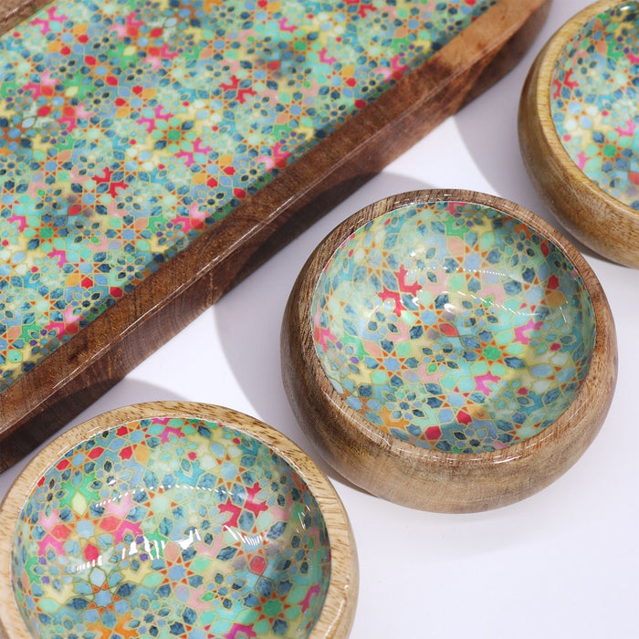 The Window, Milford Haven mango wood serving tray and three bowls featuring a vibrant Mediterranean tile pattern.