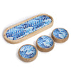 The Window, Milford Haven mango wood tray set with three small bowls featuring a blue herringbone stripe pattern.
