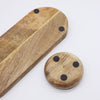 Underside of The Window, Milford Haven mango wood tray and bowl showing protective black felt pads on natural grain