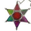 The Window, Milford Haven multi-coloured glass and iron star lantern with embossed floral patterns and hanging chain.
