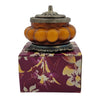 Song Of India Patchouli Amber scented candle in an orange pumpkin-shaped glass jar from The Window, Milford Haven.