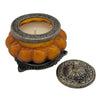 The Window, Milford Haven Song Of India orange Patchouli Amber scented soy candle in an antique pumpkin glass jar
