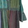 The Window, Milford Haven patchwork cotton midi dress in green and blue tones with lace trim and long flared sleeves.