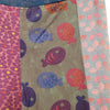 The Window, Milford Haven patchwork cotton flares featuring vibrant pink and blue fish and floral prints.