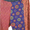 The Window, Milford Haven patchwork cotton flared trousers in vibrant pink and blue floral and geometric prints