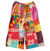 The Window, Milford Haven wide-leg Kantha trousers in multicoloured patchwork cotton with a beige elasticated waistband.