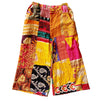 The Window, Milford Haven wide-leg Kantha trousers in vibrant patchwork cotton with a pink waistband and side pockets.
