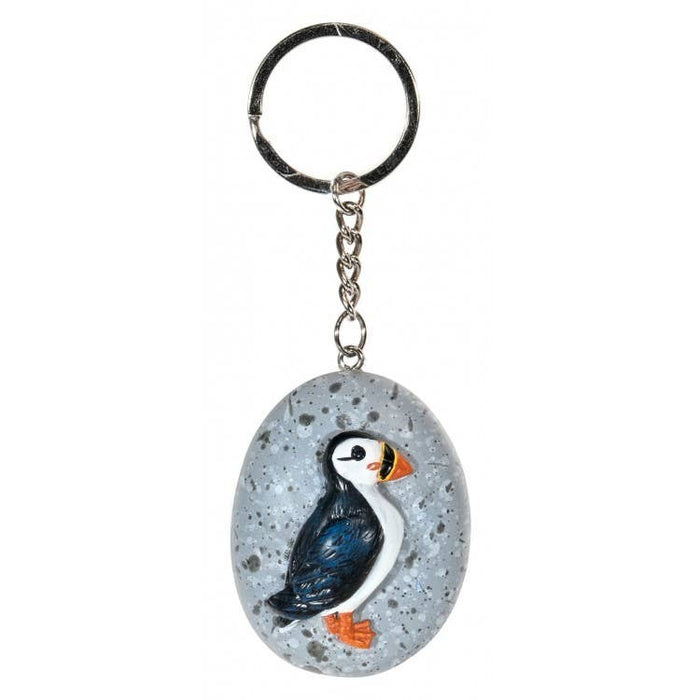 The Window, Milford Haven puffin keyring featuring a detailed puffin illustration on a grey speckled pebble charm.