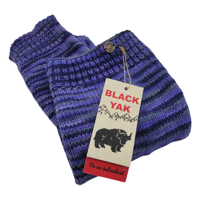 The Window, Milford Haven electric purple hand-knitted wool leg-warmers with Black Yak brand tag and wooden button.