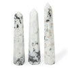 The Window, Milford Haven Rainbow Moonstone six-face obelisk point with milky white tones and natural dark inclusions.