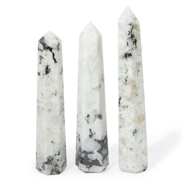 The Window, Milford Haven Rainbow Moonstone six-face obelisk point with milky white tones and natural dark inclusions.