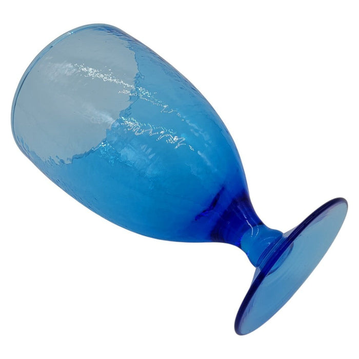 The Window, Milford Haven ice blue recycled glass wine glass with a unique hammered texture and stemmed design.