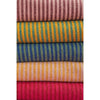 The Window, Milford Haven recycled cotton striped throws in various colours including pink, mustard, blue, and red.