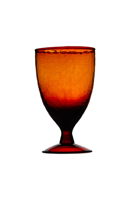 The Window, Milford Haven recycled berry red wine glass with a textured, hammered finish and 500ml capacity.