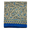 The Window, Milford Haven recycled sari scarf featuring a beige background with blue floral patterns and a blue border.