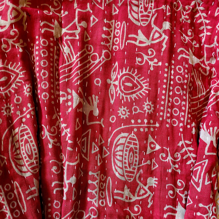The Window, Milford Haven red cotton dressing gown featuring intricate white Kantha embroidery and bohemian patterns.