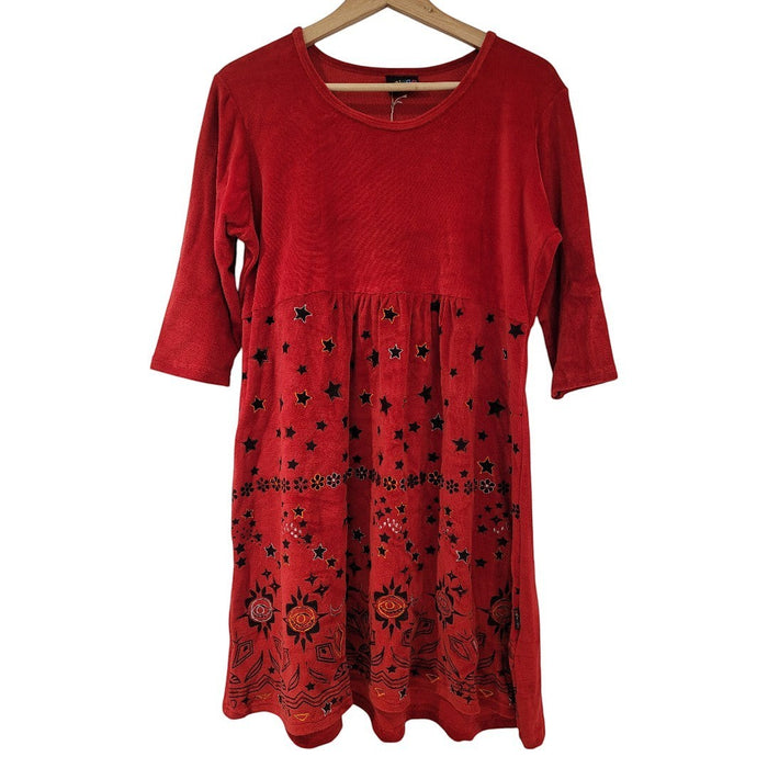 The Window, Milford Haven red velour tunic dress featuring embroidered star and flower patterns and three-quarter sleeves.