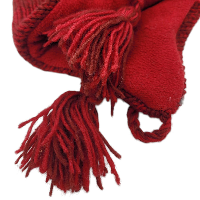 The Window, Milford Haven red wool monster hat with fleece lining and decorative tassels, handmade in Nepal.