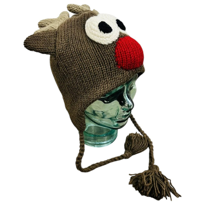 The Window, Milford Haven handmade wool reindeer hat with fleece lining, ear-flaps, and red nose on a mannequin head.