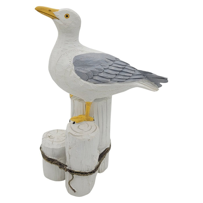 The Window, Milford Haven resin seagull figurine perched on a white wooden post with nautical rope detail.