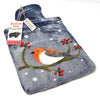The Window, Milford Haven Black Yak wool felt hot water bottle featuring a hand-stitched robin design on blue felt.