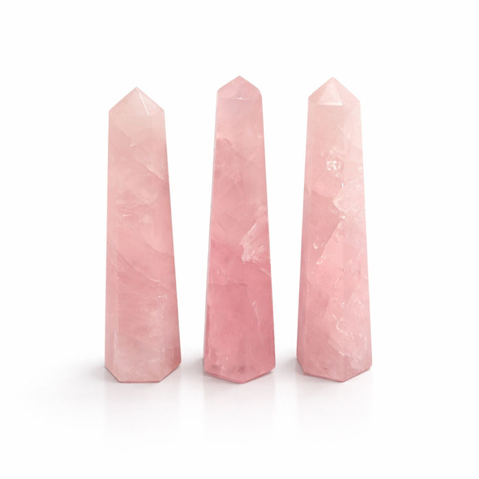 Three The Window, Milford Haven rose quartz six-face obelisk points with a polished finish and soft pink tones.