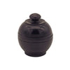 The Window, Milford Haven natural patchouli solid perfume in a hand-carved dark rosewood jar with a screw-top lid.