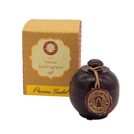 The Window, Milford Haven Song Of India natural solid perfume in a carved rosewood jar with its eco-friendly box.