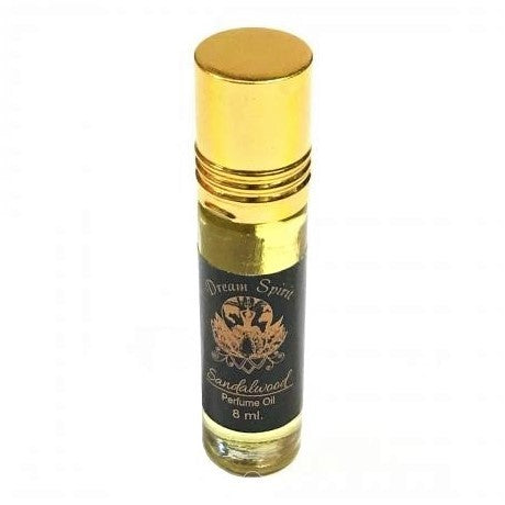 The Window, Milford Haven Dream Spirit Sandalwood roll-on perfume oil in an 8ml glass bottle with a gold cap.