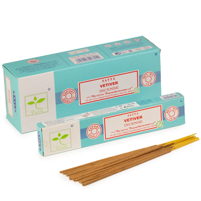The Window, Milford Haven Satya Vetiver incense sticks in teal and white packaging with a bundle of bamboo sticks