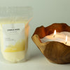 The Window, Milford Haven Blush Bloom fragranced candle sand in a wooden bowl with a refill pouch of stearic wax beads