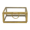 The Window, Milford Haven small rectangular glass jewellery box with a gold metal frame and circular handle.