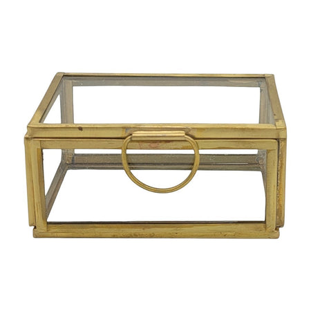 The Window, Milford Haven small rectangular glass jewellery box with a gold metal frame and circular handle.