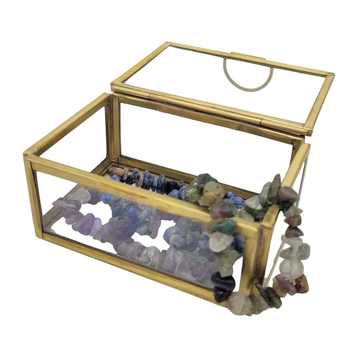 The Window, Milford Haven small rectangular glass jewellery box with a brass metal frame and gemstone beads inside.