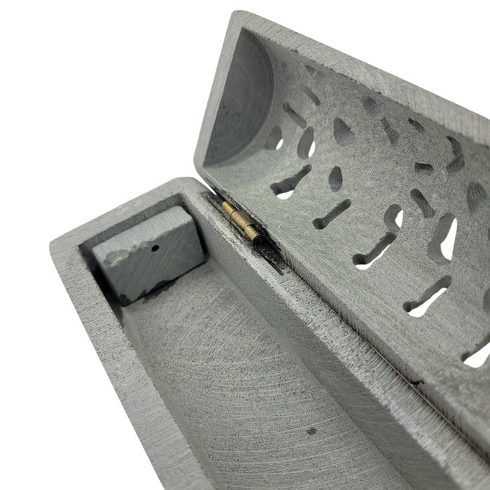 The Window, Milford Haven grey soapstone incense stick holder box with intricate floral cutouts and a hinged lid.